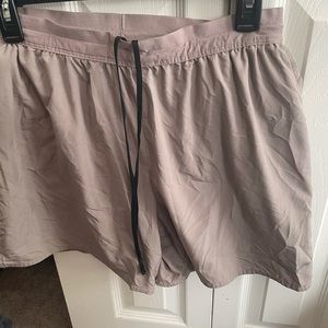 PAIR of NIKE DRYFIT shorts. Tan and Gray.